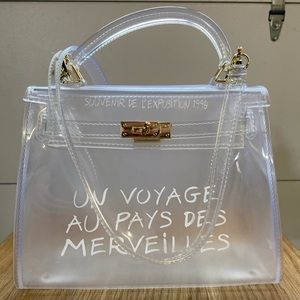 Clear Un Voyage Crossbody